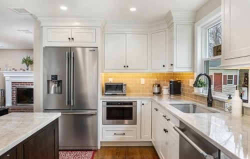 Cabinet refinishing - white painted kitchen cabinets